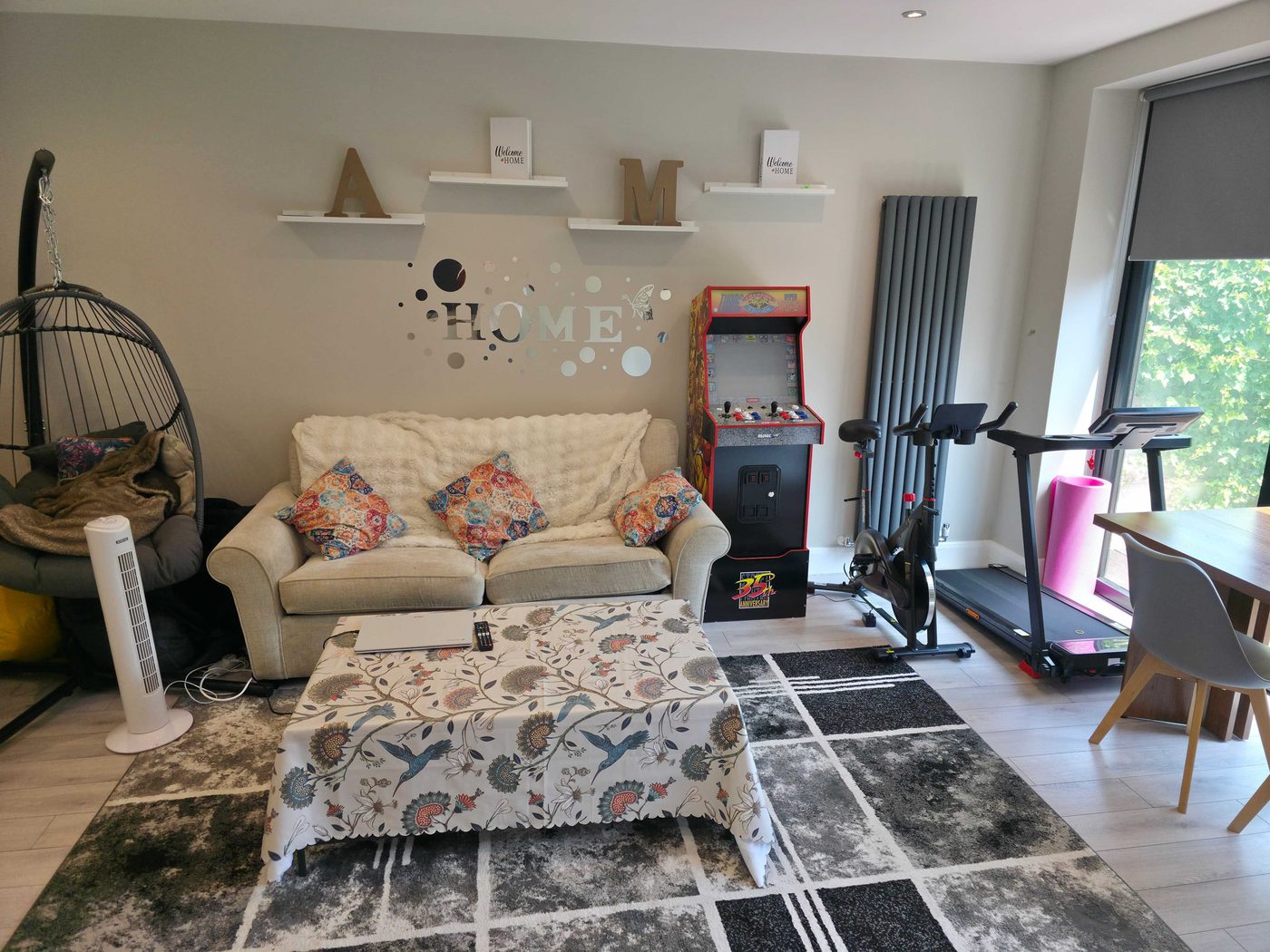 Lounge and activity area with games at Shapes