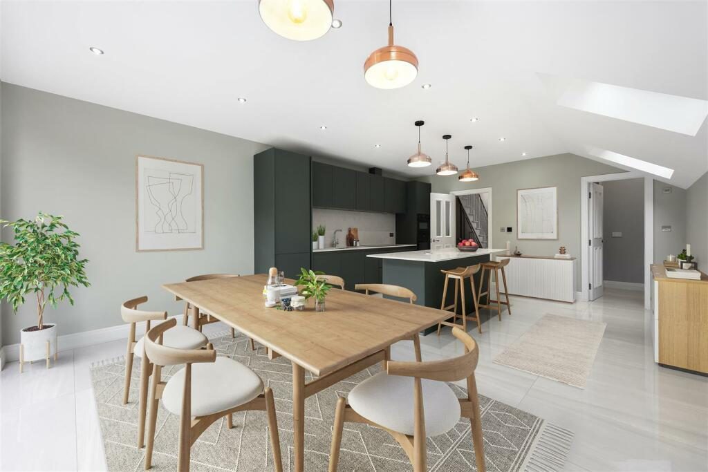 Open-plan kitchen and dining area at Turtle Green
