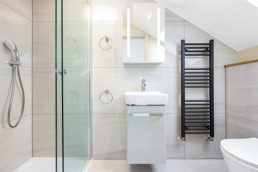 Modern shower room with basin at Turtle Green
